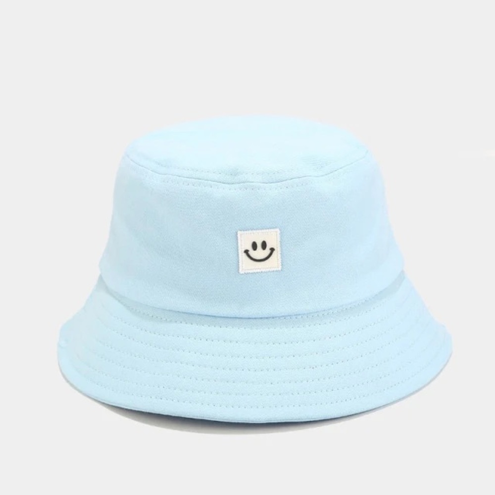 Blue smiley face bucket hat. New